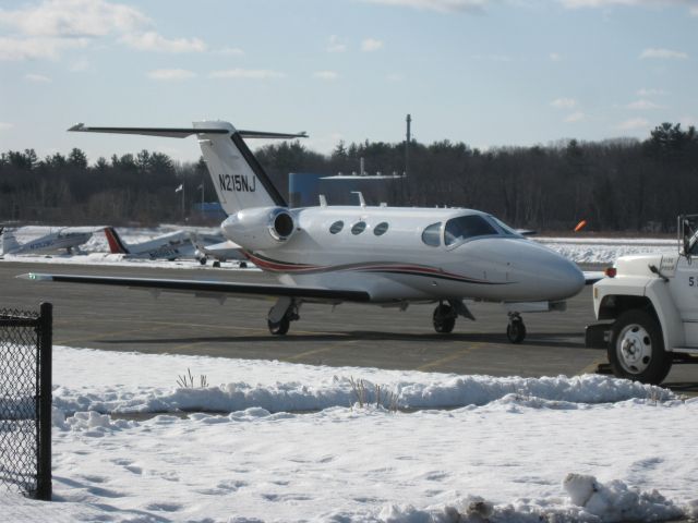 Cessna Citation Mustang (N215NJ) - Sitting head to head with the fuel truck after arriving from Charleston, SC (KCHS).