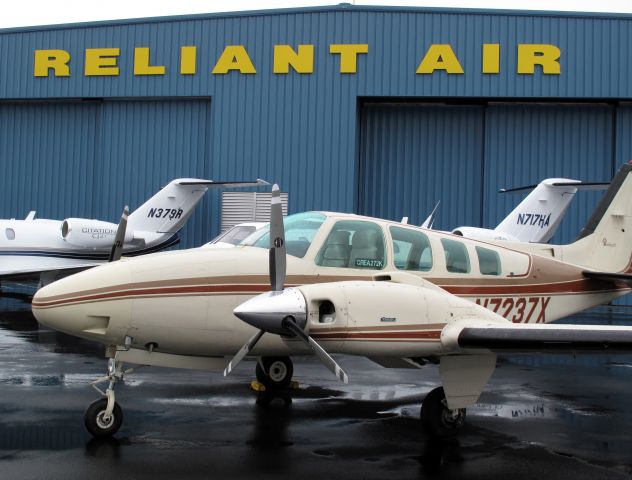 Beechcraft Baron (58) (N7237X) - At RELIANT AIR, where you find the lowest fuel prices at Danbury (KDXR) airport!