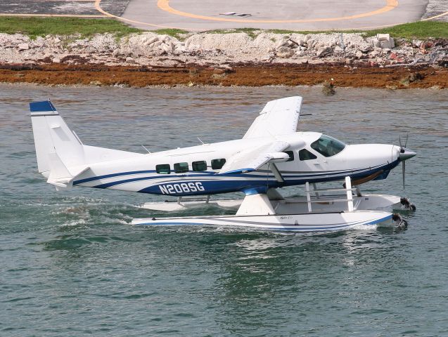 Cessna Caravan (N208SG) - Just about to take  off.