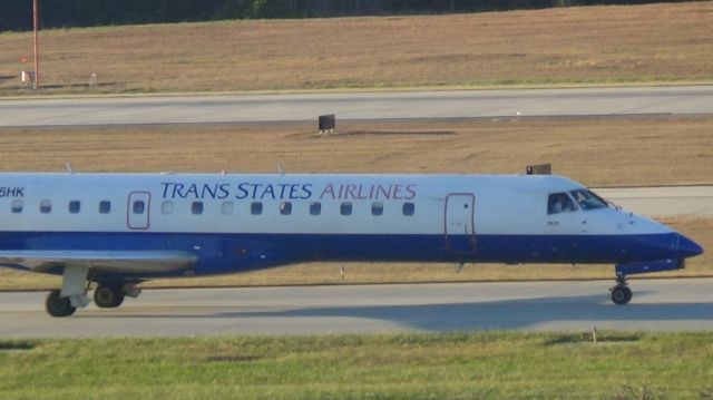 Embraer ERJ-145 (N806HK) - An EX-United Trans States EMB-145 taxing to runway 23R.  Taken December 11, 2014.