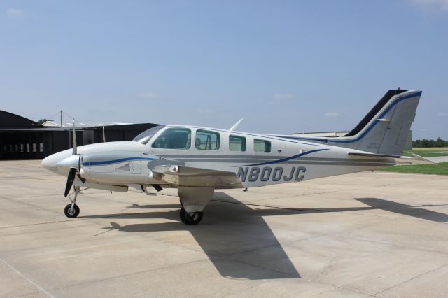 Beechcraft Baron (58) — - Looking SW on the ramp at Helena