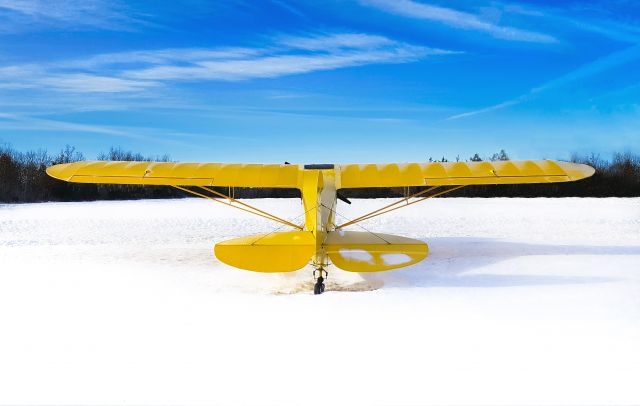 C-FNGQ — - Enjoying the View... generally my little cub is in a hangar but occasionally it likes to get out for a little fresh air, even on those cold winter days. 1945 Piper J3 Cub (C-FNGQ), Stirling Airport (CPJ5), Ontario, Canada 