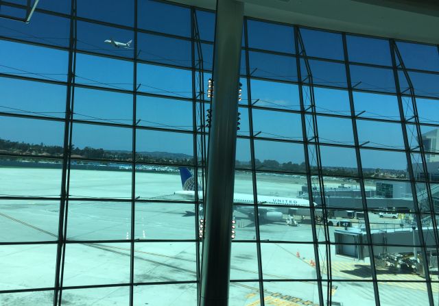 Boeing 787-8 — - One of the two direct flights overseas from San Diego (the other being British Air 777 to Heathrow). As small as the plane is in the photo, I thought it was interesting caught through their new terminal 2s window. 