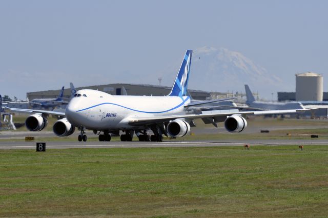 BOEING 747-8 (N5017Q) - Mt. Rainier provides a beautiful backdrop for this B748 after one of its final testflights in summer of 2011