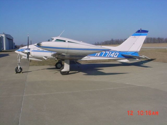 Cessna 310 (N7714Q) - Parked on ramp on 2/12/09... Planning photo shot... set up on GPS point...