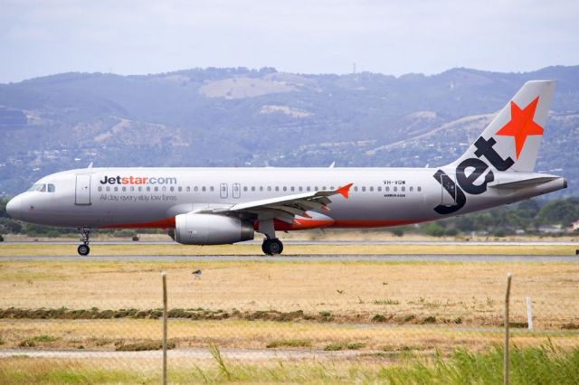 Airbus A320 (VH-VQW) - Heading for Terminal 1 after landing on runway 23, on the last day of the Australian summer. Thursday 28th February 2013.