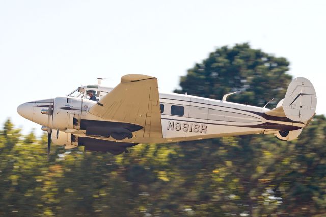 Beechcraft 18 (N9918R) - Beech G18S over Virginia Beach Airport, October 2021.