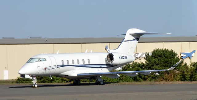 Canadair Challenger 350 (N312EA) - Catching some tarmac time is this 2015 Bombardier Canadair Challenger 350 in the Autumn of 2022.