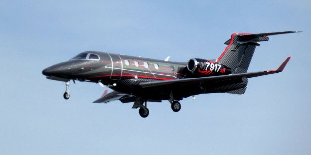 Embraer Phenom 300 (N7917) - About to touch down is this Embraer PHENOM 300 in the Spring of 2025. 
