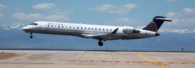 Canadair Regional Jet CRJ-700 (N164GJ) - Arriving on 16L.