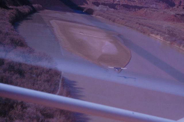 Cessna Skylane (N795CB) - Landing on sandbar on the Green River Utah near Mineral Canyon.