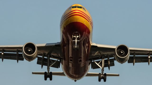 — — - DHL, A300F, on short finals to runway 027R at LHR.