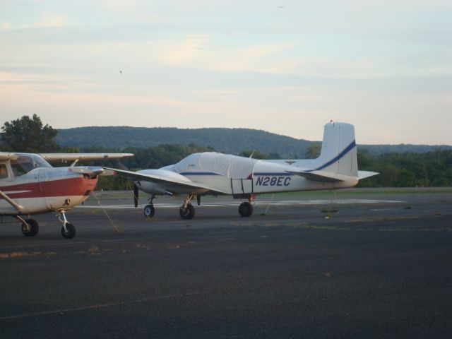 Beechcraft Twin Bonanza (N28EC) - N28EC parked at 4B8.