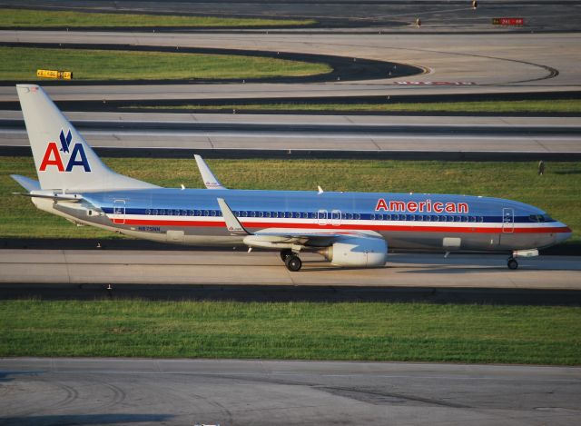 Boeing 737-800 (N875NN) - Taxiing out at dawn 6/16/12