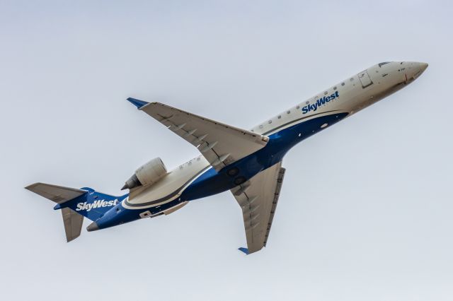 Canadair Regional Jet CRJ-700 (N741EV) - A SkyWest CRJ700 taking off from PHX on 3/11/23. Taken with a Canon R7 and Canon 100-400 EF L II lens.