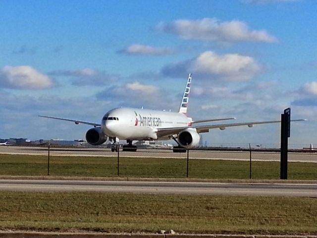 Boeing 777-200 — - On the pad out my AA's hanger in Chicago. 