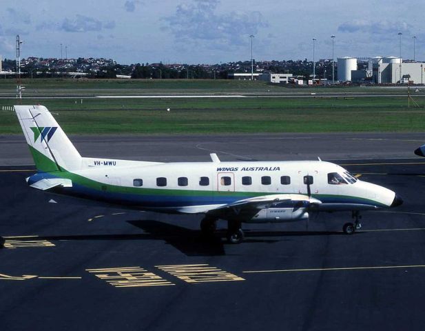 Embraer EMB-110 Bandeirante (VH-MWU) - Photo of VH-MWU in Wings Australia service at Sydney Airport in 1981.