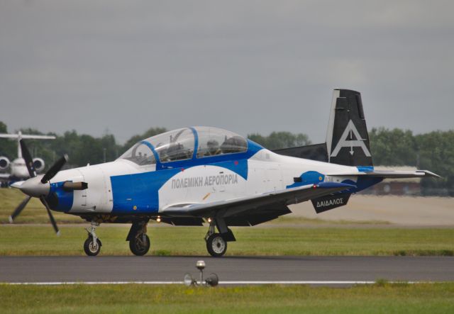 — — - Hellenic air force T6A Texan taxiing down the runwayu after its performance at RIAT '19