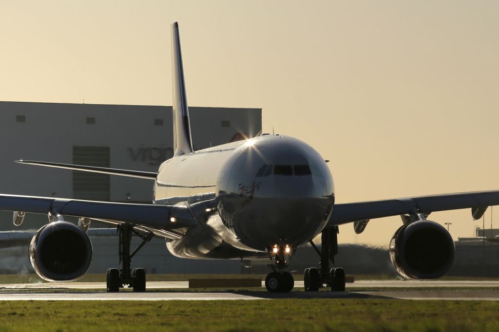 Airbus A330-300 — - Lining up on runway 027R at LHR.