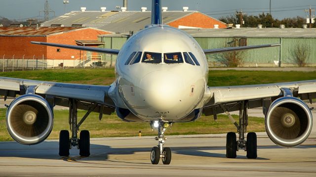 Airbus A321 (N314DN) - Exiting 4 at N6 after arrival.