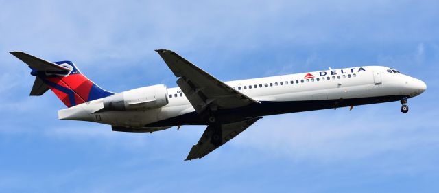 Boeing 717-200 (N964AT) - Angry Puppy on approach to 23R, 6/15/18.