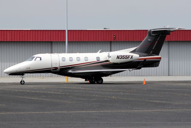 Embraer Phenom 300 (N355FX) - Flight Options Phenom 300 seen here on 12-May-16 on a five-night layover, departing for KLAS on 15-May-16 as OPT355.