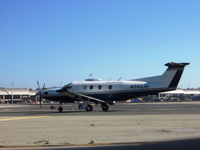 Pilatus PC-12 (N242JH) - Holding short RWY 20R