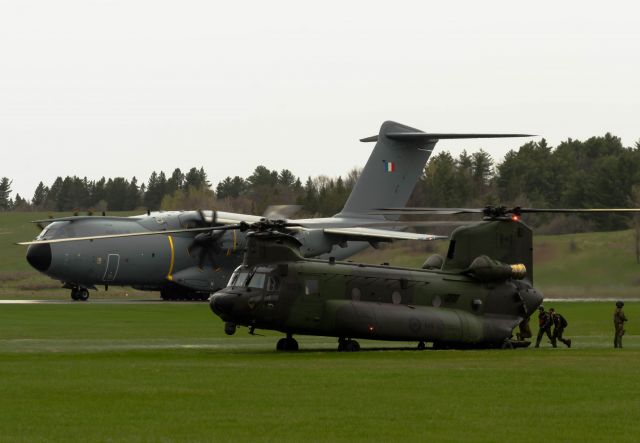 14-7303 — - The Canadian Army fame Skyhawk Team embarking on the Chinook for opening ceremonies.