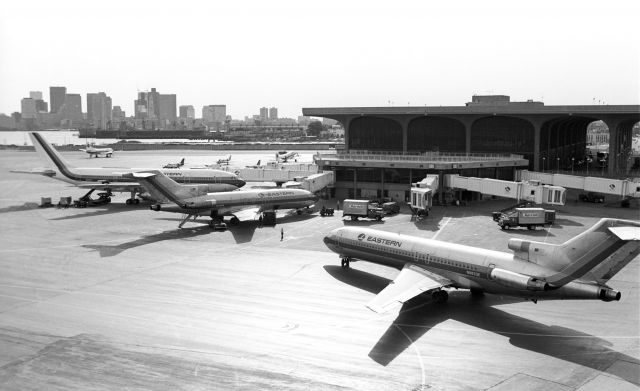 Boeing 727-100 (N8833E) - Eastern terminal in the 1980's. N8833E and N8128N are visible.<br>The bigger plane behind is airbus 300 N222EA.