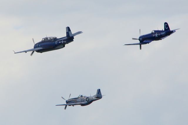 — — - Warbirds over Wausau, Wisconsin, USA.br /North American P-51 Mustang, Vought F4U Corsair, and a Grumman Avenger.br /June 2022