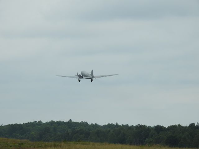 — — - DC-3 off and away at CYQA Muskoka Canada