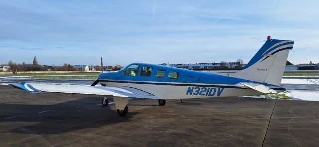 Beechcraft Bonanza (36) (N321DV) - North side hangars