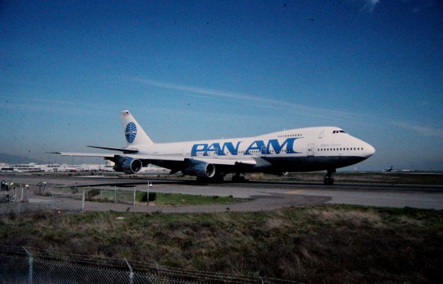 Boeing 747-200 — - San Francisco KSFO - Clipper Cathay rolls to Runway 1R departure runway in this late 1980s photo.