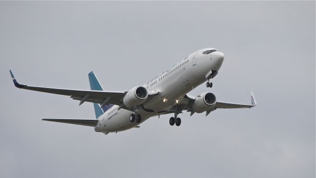 Boeing 737-800 (C-FWVJ) - BOE499 makes a missed approach over runway 16R on 12/8/11.