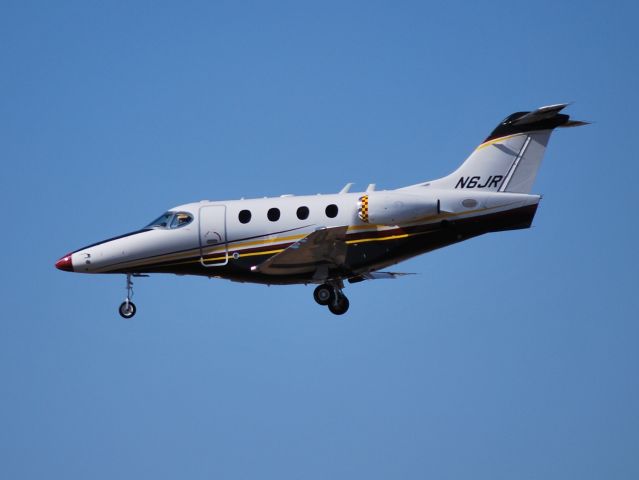 Beechcraft Premier 1 (N6JR) - ROUSH FENWAY RACING LLC (NASCAR team owner Jack Roush) on final for runway 20 at KJQF - 1/23/13