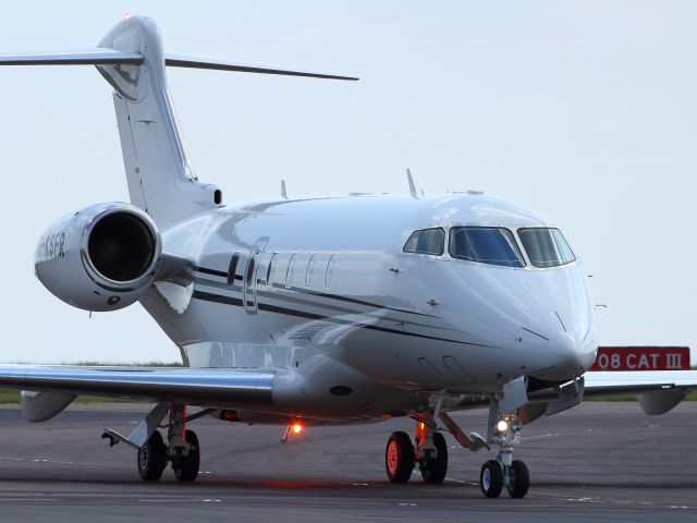 — — - Taxiing to the Buisness Jet apron at London Luton Airport.
