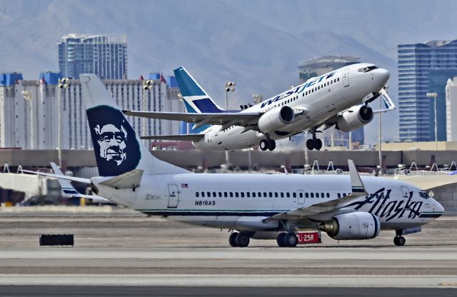 Boeing 737-700 (N619AS) - N619AS Alaska Airlines Boeing 737-790  (cn 30164/597) - WestJet Boeing 737-7CT C-GQWJ / 246 (cn 35505/2436) - McCarran International Airport (KLAS)br /Las Vegas, Nevadabr /TDelCorobr /April 17, 2014