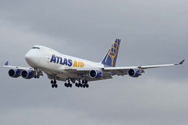 Boeing 747-400 (N415MC) - Atlas Air Boeing 747-47UF N415MC landing at Phoenix Sky harbor on December 23, 2015. It first flew on April 19, 2002. Its construction number is 32837. It was delivered to Atlas Air on June 28, 2002. 