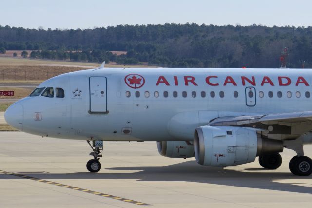 Airbus A319 (C-GBIN) - Air Canada A319 Carolina Hurricanes Charter 12/28/13