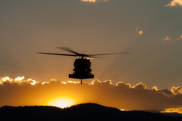 — — - Black Hawk helicopter during rescue evac of stranded flood victims in Boulder County 2013