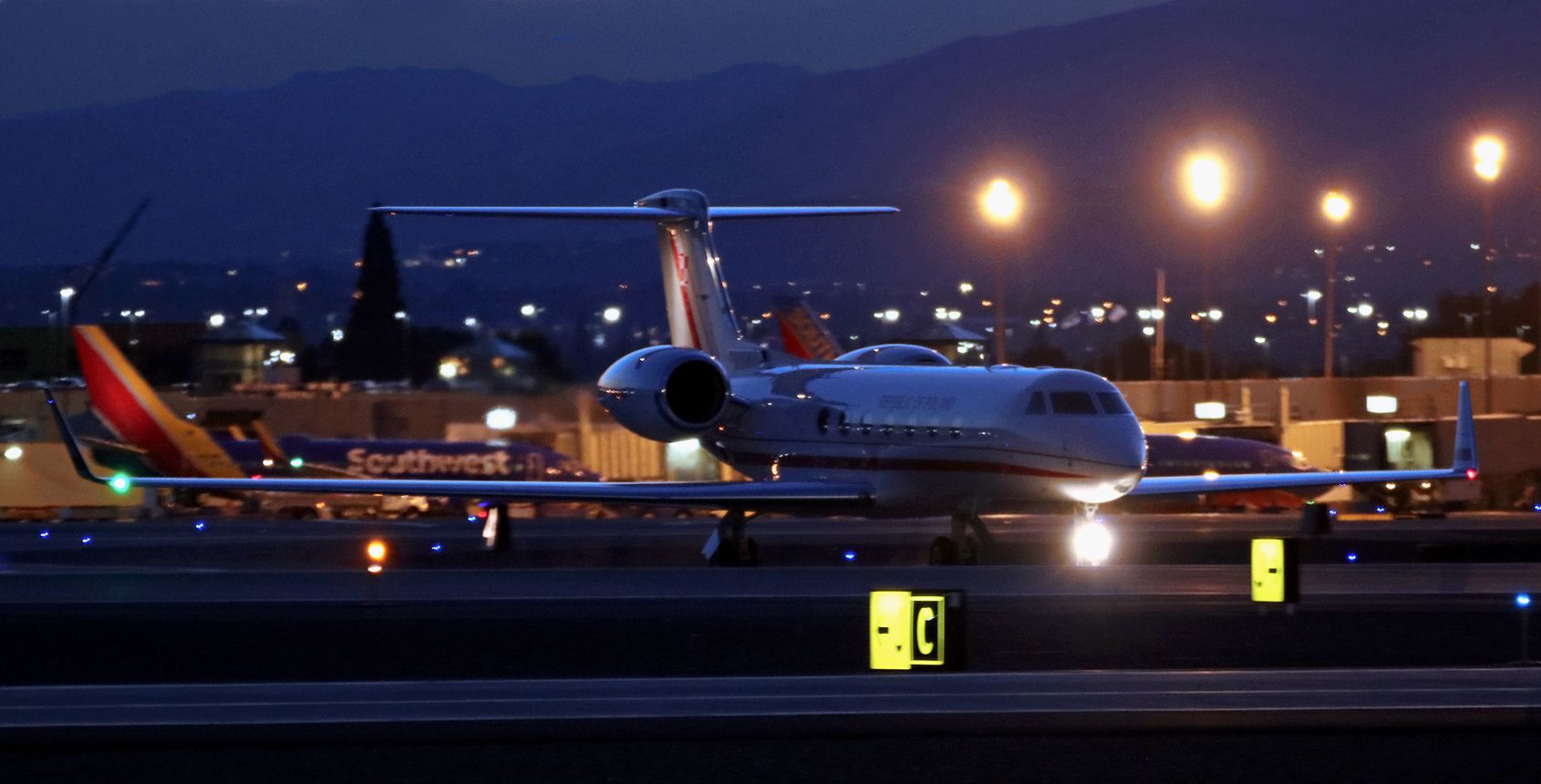Gulfstream Aerospace Gulfstream V (0002) - The Republic of Poland VIP Gulfstream G550 "Gen Kazimierz Pulaski" (1745-1779), seen here as Poland's Presidential Aircraft because Poland's President Andrzej Duda and First Lady Agata Kornhauser-Duda are aboard, crosses RNO's runway 34R-16L on Juliet taxiway in the very final moments of dusk light last night (June 14, 2019) to park on the Atlantic Aviation ramp. The President and First Lady were welcomed to Reno by a group of local dignitaries. The US Secret Service, Polish government security, Nevada Highway Patrol, Reno Police, and RTAA airport security were also present. Our media group was permitted to gather in a small area on the ramp to photograph the arrival of President and First Lady Duda. br /** My most very sincere Thank You to officials of Reno Tahoe Airport Authority, the United States Secret Service, and Atlantic Aviation for the invitation and authorization to be present for this event.