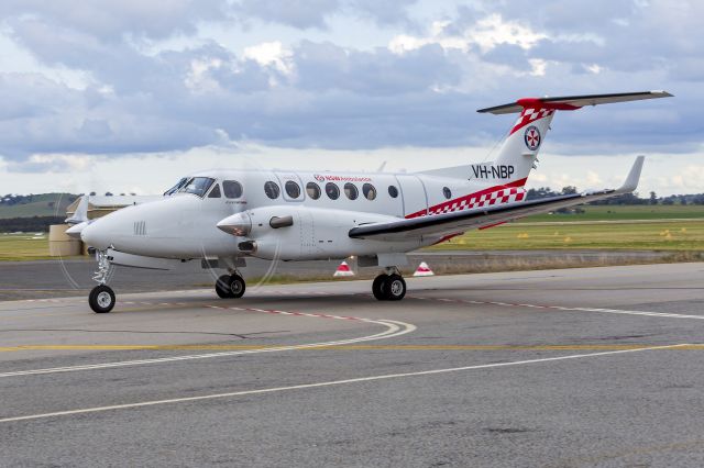 Beechcraft Super King Air 350 (VH-NBP) - Pel-Air (VH-NBP) Beechcraft King Air B350C, in new NSW Ambulance livery, at Wagga Wagga Airport.br /br /VH-NBP, is not yet officially registered as VH-AMQ/R but will in the near future, with Pel-Air taking over the aero medical retrieval contract in January 2022.