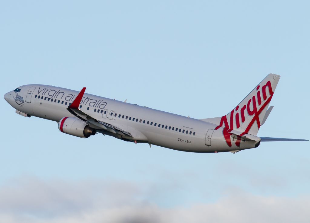 Boeing 737-800 (ZK-PBJ) - 'Trigg Beach' Ex Pacific Blue aircraft now wearing the Virgin Australia scheme.. Departing RWY 19 early 8/2/14