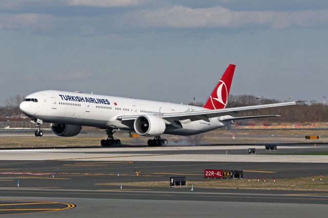 BOEING 777-300ER (TC-LJA) - THY1 from Istanbul makes firm contact with the runway.