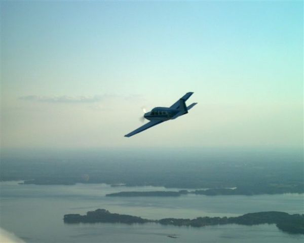 Beechcraft Bonanza (36) (N7747R) - Bird over Lake Hartwell