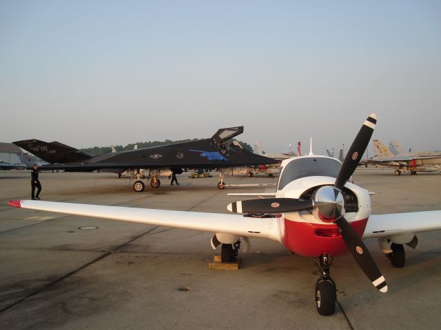 — — - My airplane, a Bellanca Viking, sits at Oceana NAS at the 2006 Airshow - and she meets a famous friend