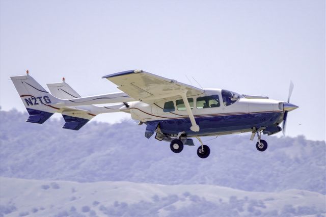 Cessna Super Skymaster (N2TG) - Cessna T337D Turbo Super Skymaster departs Livermore Municipal Airport (CA), landing gear down. May 2021.