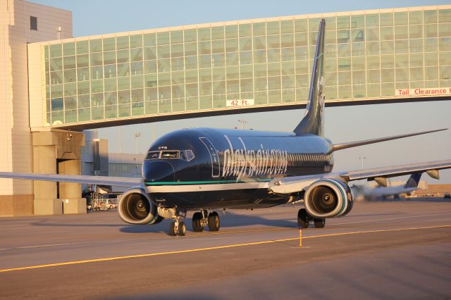 Boeing 737-800 (N548AS) - Taxiing out for take off at DIA.