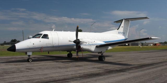 Embraer EMB-120 Brasilia (N707TG) - A Berry Aviation Embraer EMB-120ER on the ramp at Boswell Field, Talladega Municipal Airport, AL - morning, June 5, 2020. 