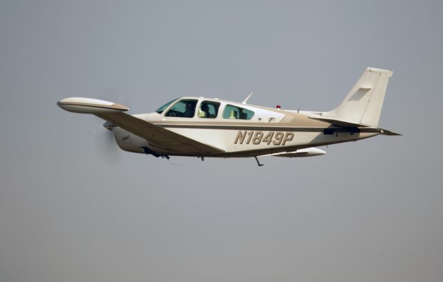 Beechcraft Bonanza (33) (N1849P) - Take off RW26.